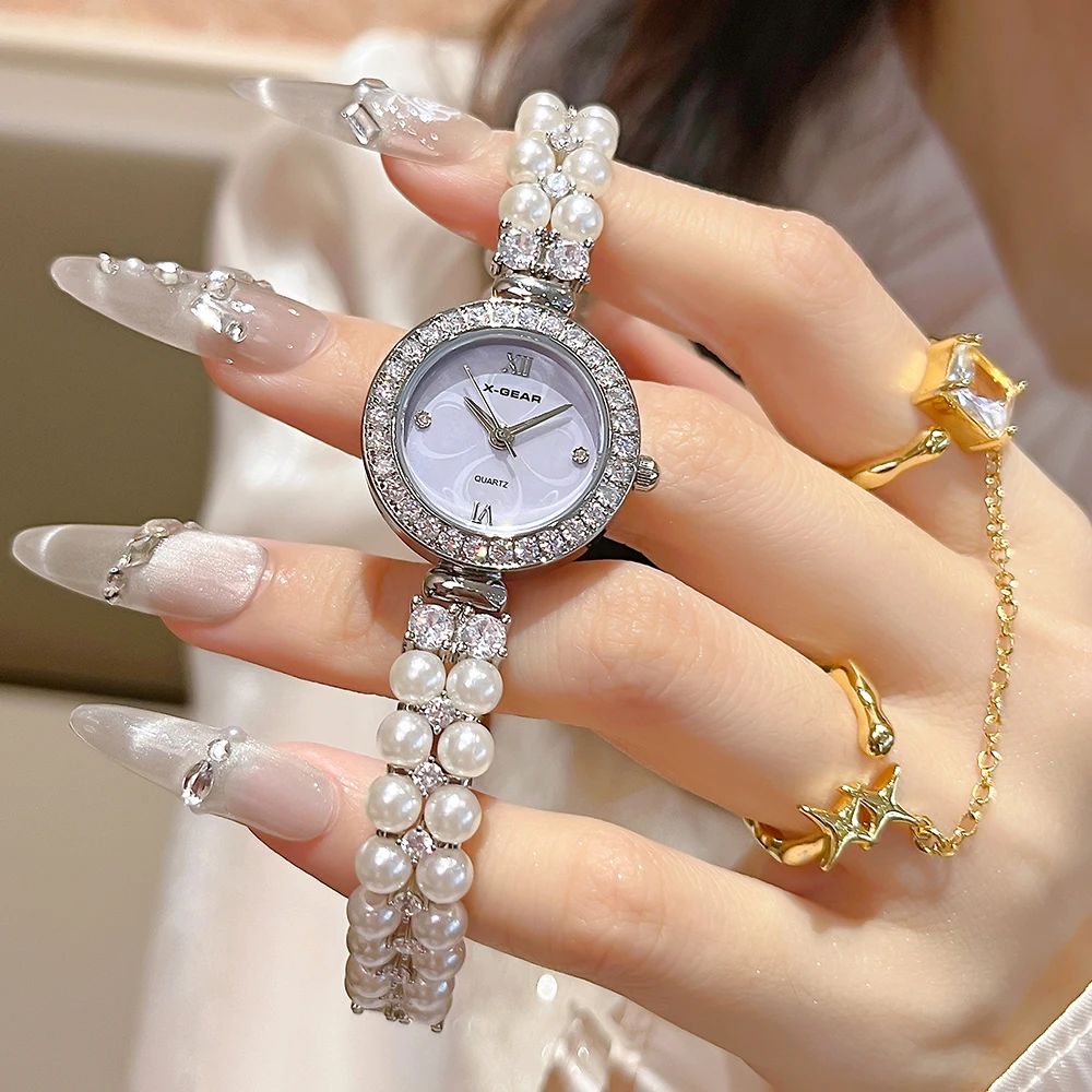 ساعة X-GEAR النسائية الأنيقة باللؤلؤ - ساعة يد كوارتز فاخرة مع سوار من الفولاذ المقاوم للصدأ