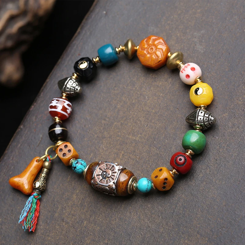 multi- bracelet, traditional bone inlay, Yujian ear bagua beads, coconut agate, dzi bead accessories