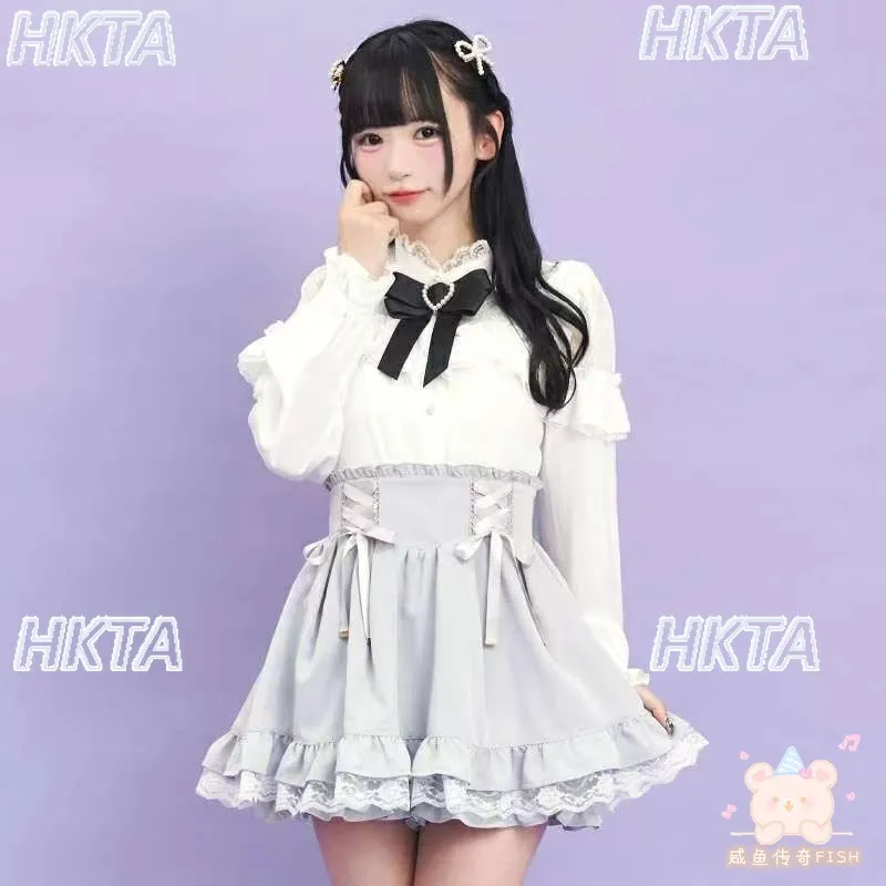 Japońskie, masowo produkowane bluzki Lolita z koronkowymi wstawkami i kokardą na jesień, uniwersalne, słodkie bluzki z długim rękawem i półgolfem dla dziewcząt.