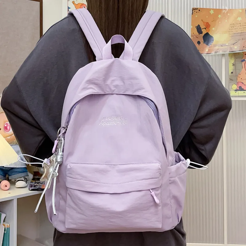 Solid color women's backpack2026New versatile and stylish lightweight school backpack for middle and high school students