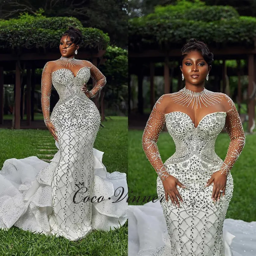 

Customized High Quality Luxury Crystal Beading Mermaid Wedding Dress Ruffle Train 2026 Long Sleeves Sexy Bridal Dress W1468
