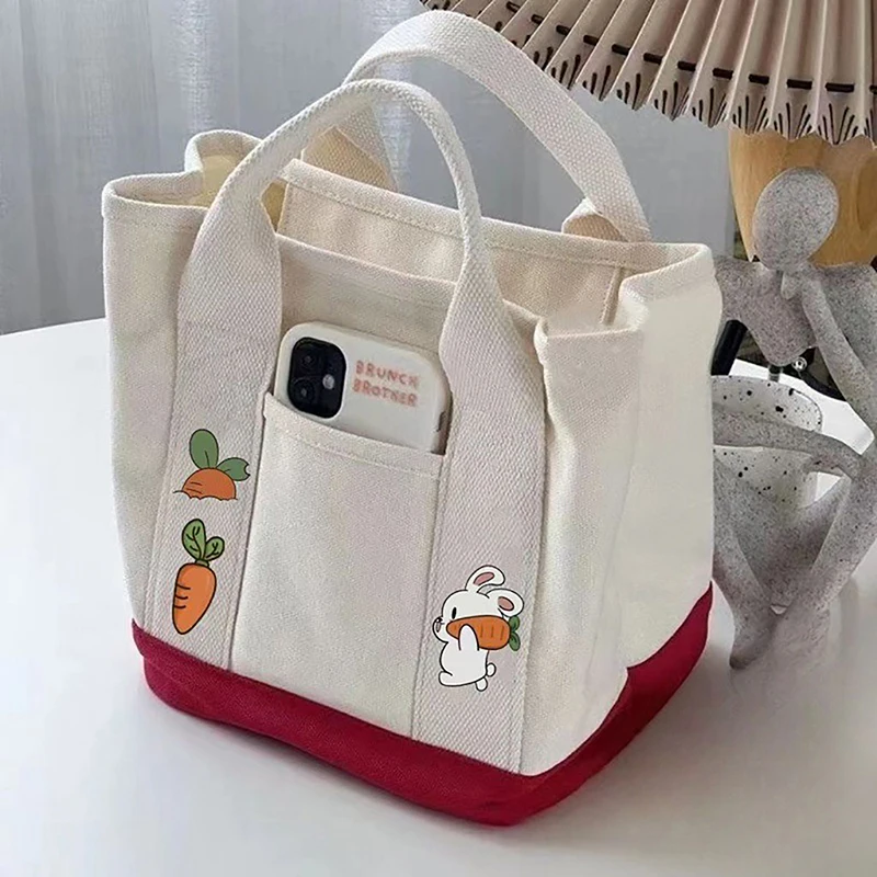 1 bolso de mano de lona con dibujos de conejo y zanahoria para mujer, bolso de mano portátil de gran capacidad con múltiples bolsillos para el almuerzo
