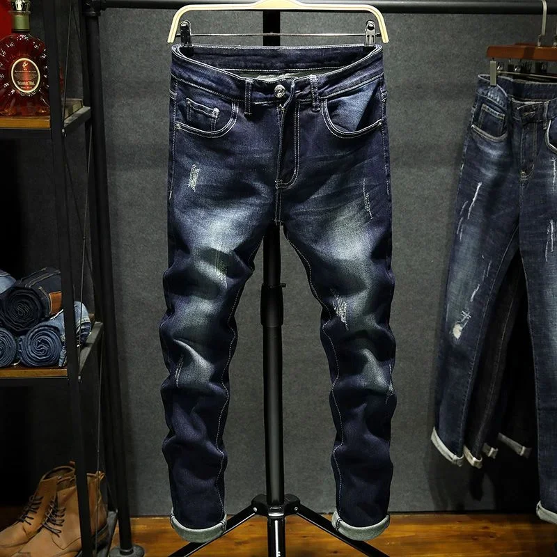 Nowa wiosna jesień koreański moda Stretch Denim chłopcy dżinsy typu Boyfriend markowe ubrania spodnie Skinny fit męskie Slim, niebieska poszarpane spodnie