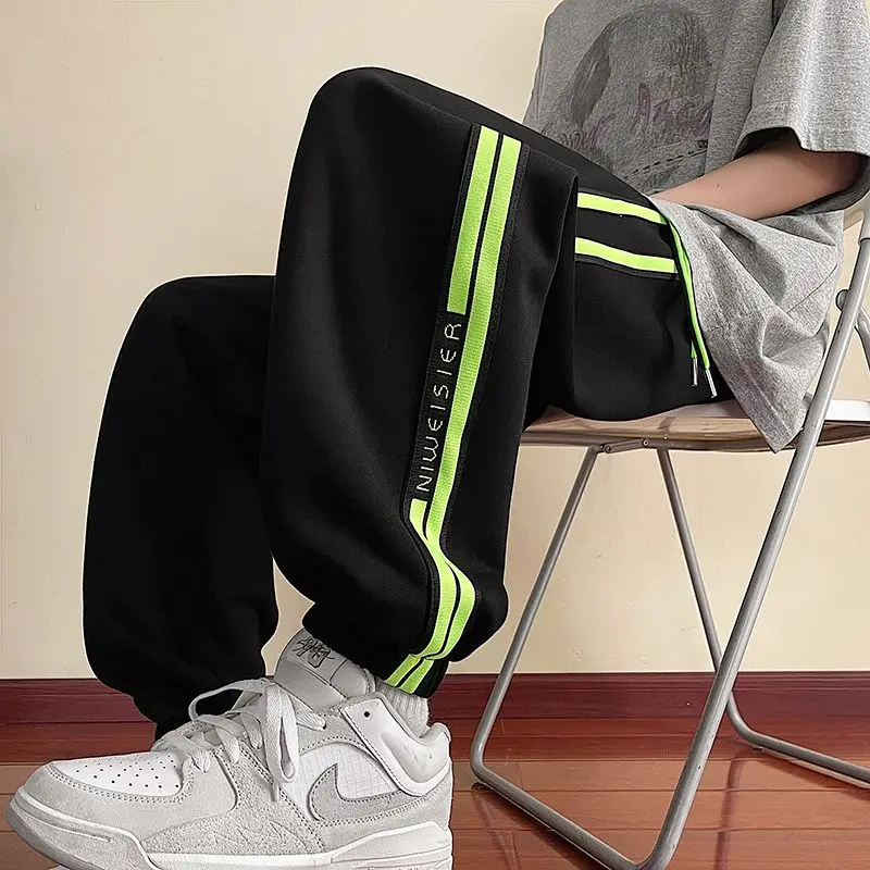 Spring and Autumn New Fashion Striped Size Sleeve Sleeve Pants Loose Sport Pants Casual Sport Pants Men