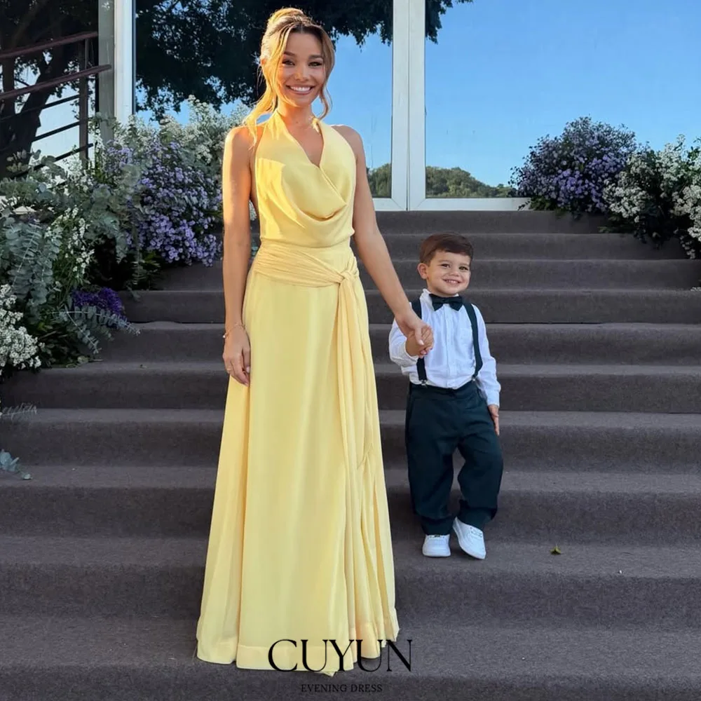 

CUYUN Customized Yellow Women Wedding Guest Dress Bridesmaid Gown Backless Sexy Long Summer Vacation Party Dresses 2026