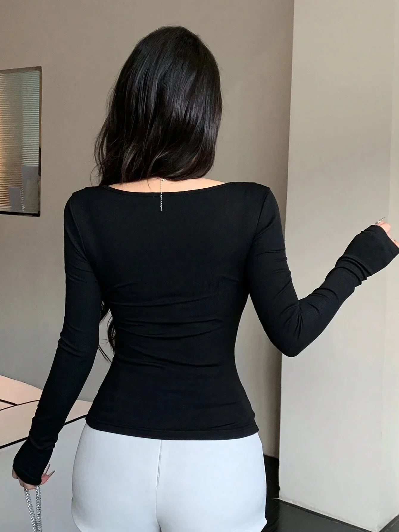 Camiseta de manga larga anudada de color sólido informal de moda para mujer Top básico cómodo y holgado con cuello redondo