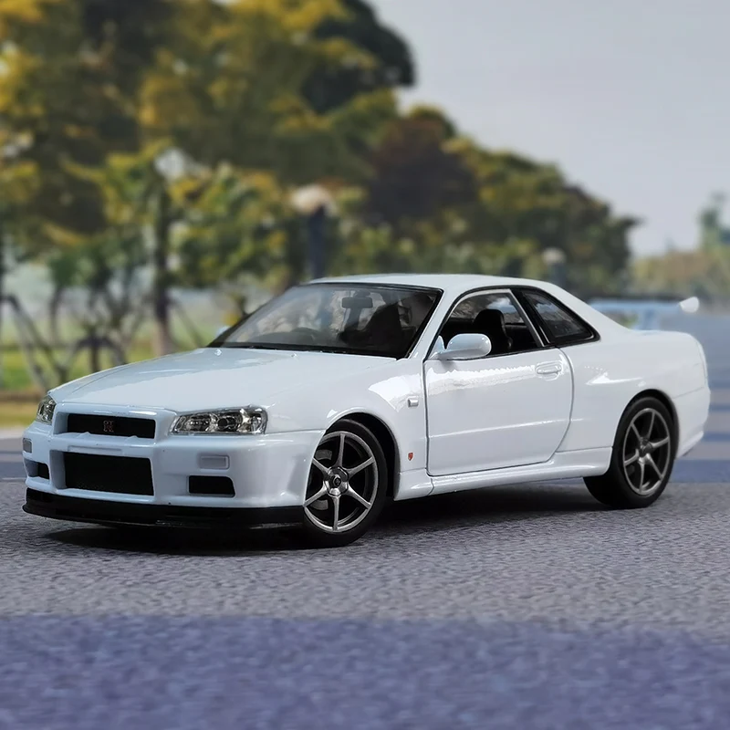 Welly-coche deportivo de aleación modelo Nissan Skyline GTR R34, juguete de Metal fundido a presión, colección de modelos de coches de carreras,