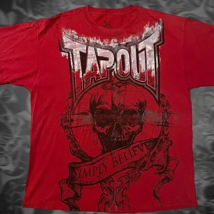 

Новинка 2025 года, футболка с короткими рукавами и принтом головы черепа TAPOUT, универсальный топ в повседневном стиле, модная рубашка с короткими рукавами и круглым вырезом