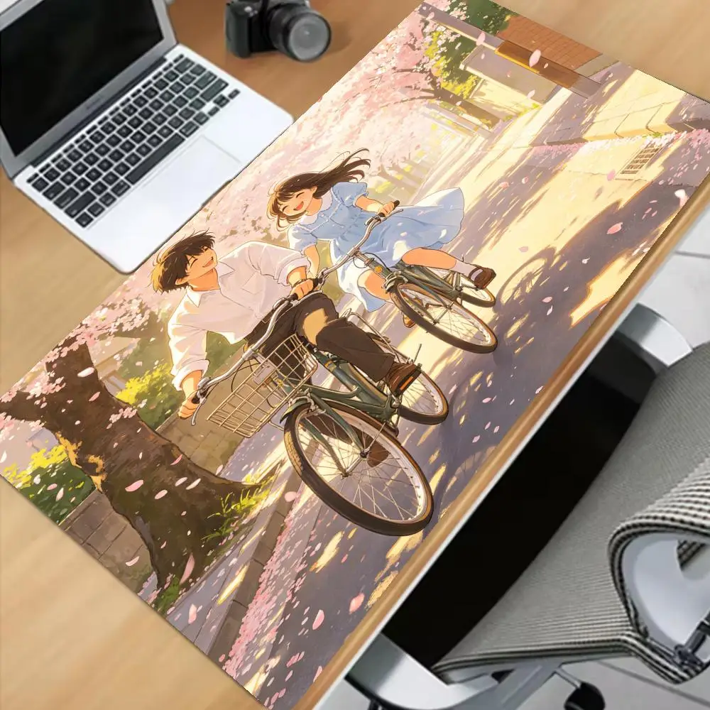 This sweet cycling couple-themed mousepad is sure to catch your eye and add a fresh, youthful touch to your desktop  XAXC