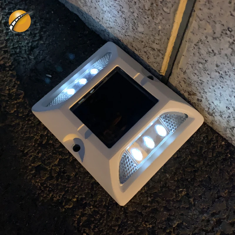 

IP68 Waterproof White Aluminum Housing Raised Road Stud with Reflector Lens Smart Solar Powered LED Flashing Light Cat Eyes