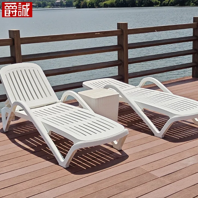 Indoor and outdoor hot spring hotel swimming pool plastic beach chairs outdoor beach loungers villa courtyard balcony bed