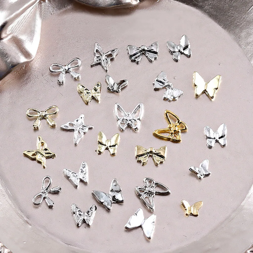 Dijes de mariposa 3D para uñas, gemas de aleación de oro y plata, Mini remaches, decoración de manicura, pajarita, accesorios de suministros para