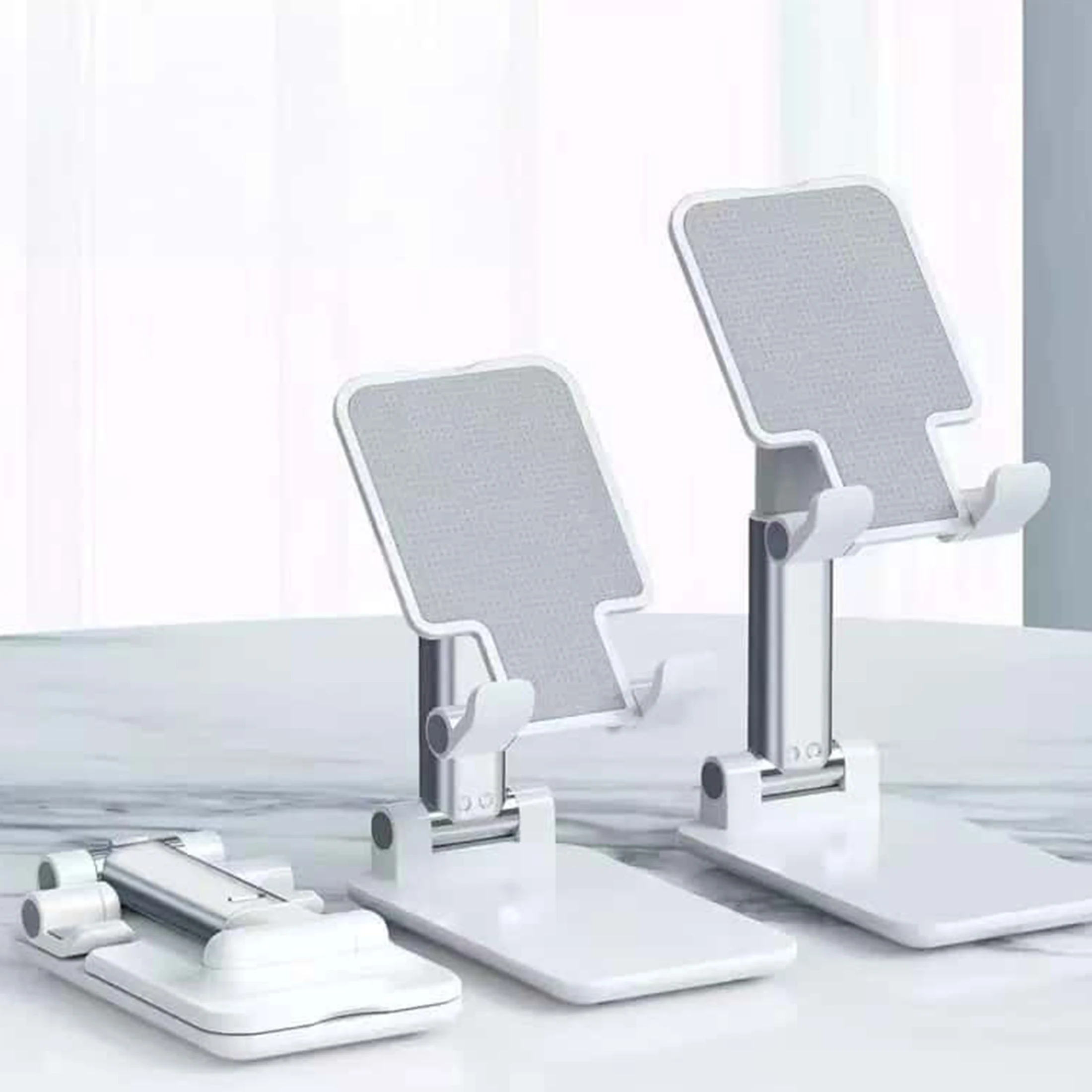 

Регулируемая и складная эргономичная подставка для телефона из поликарбоната, подходит для ежедневного использования в офисе, прочная и портативная, с возможностью просмотра под разными углами