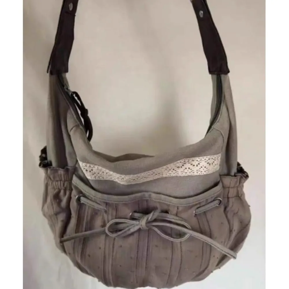 Jiaerdi süße coole Bogen Leinwand Umhängetaschen Frauen Vintage Kordel zug schicke lässige Umhängetasche Damen Retro Umhängetasche Bolsos