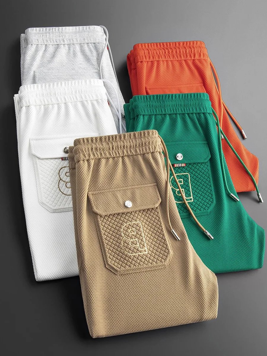 

Осенние роскошные повседневные брюки для мужчин, облегающие спортивные штаны, устойчивые к сминанию, модные универсальные спортивные длинные брюки, молодежные, энергичные, стильные