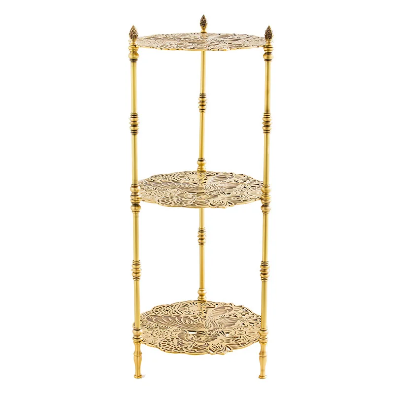 

Vintage brass carved objects, living room side table, medieval flower stand