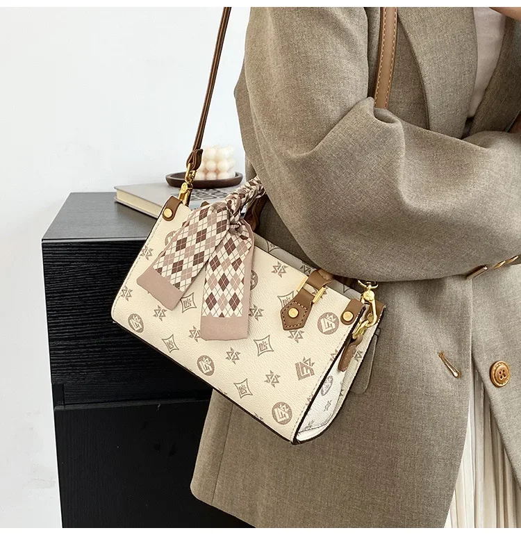 2025年新作テクスチャードハンドバッグ、レトロプリントショルダーバッグ、ニッチデザインクロスボディバッグ（女性用）