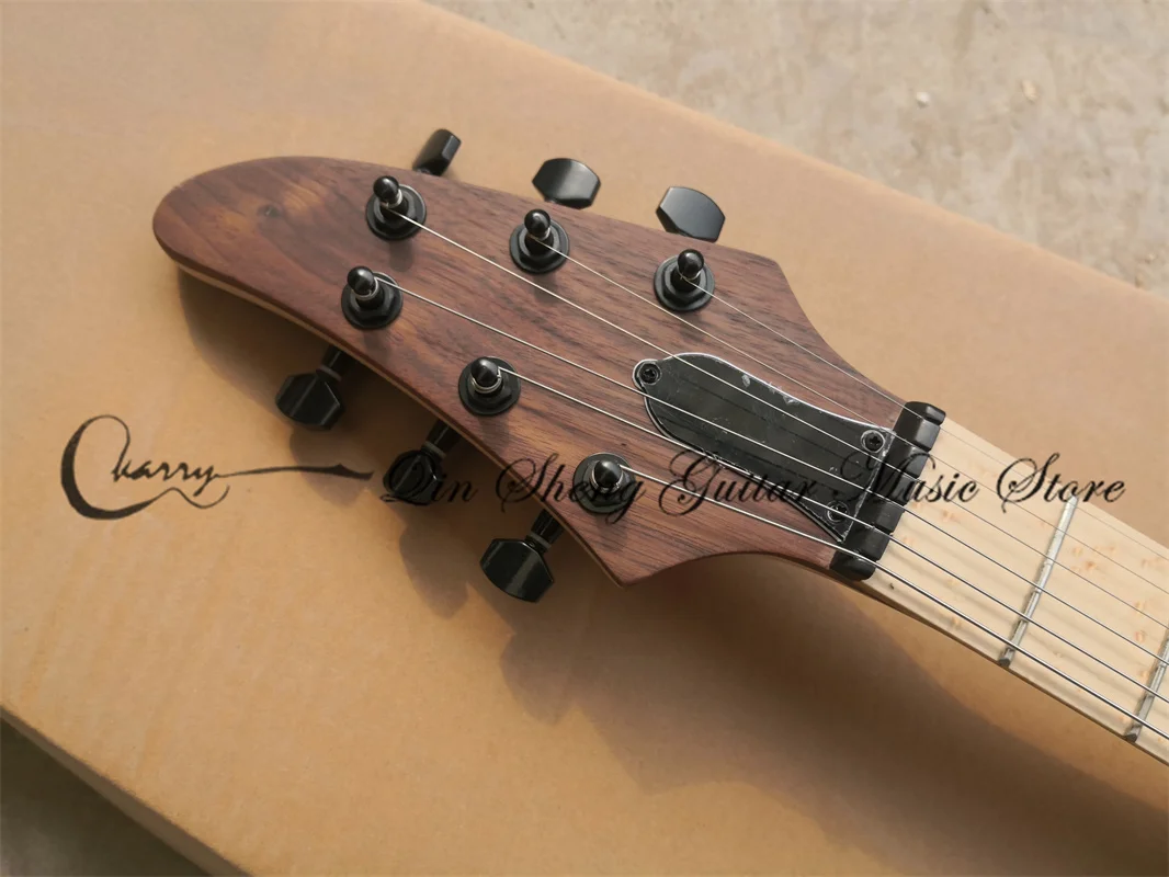 6-string electric guitar, CM guitar, maple through ash body, walnut veneer, black bridge, locking knob