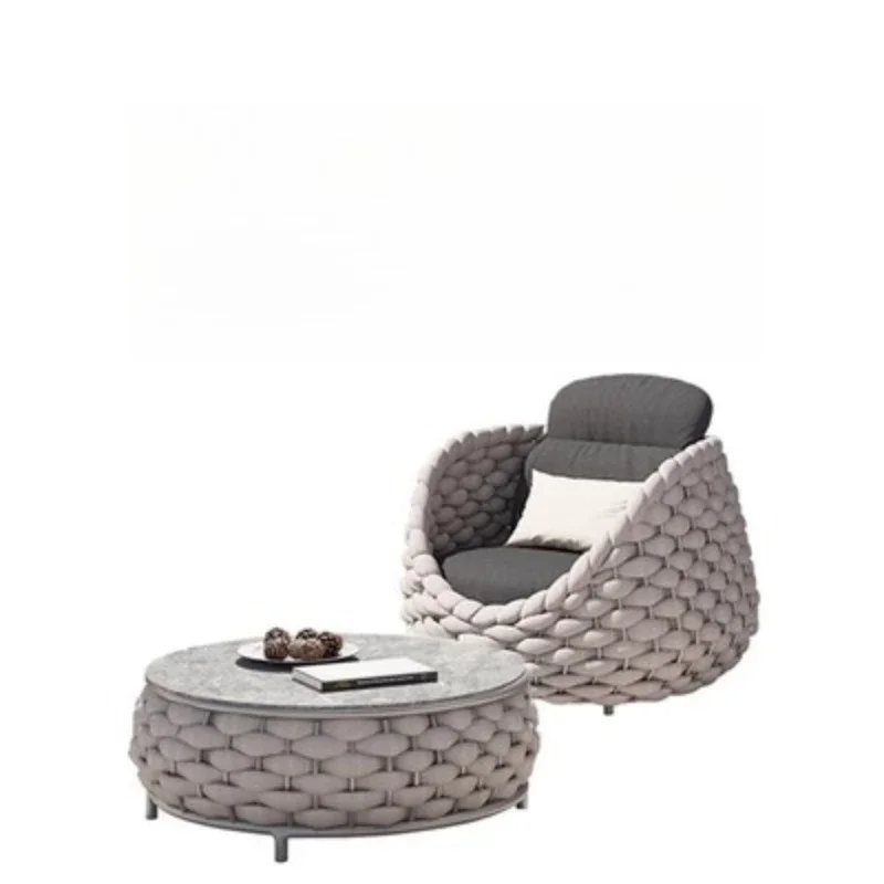 

Outdoor sofa high-end homestay villa courtyard garden waterproof and sunscreen rattan single rattan chair furniture coffee table