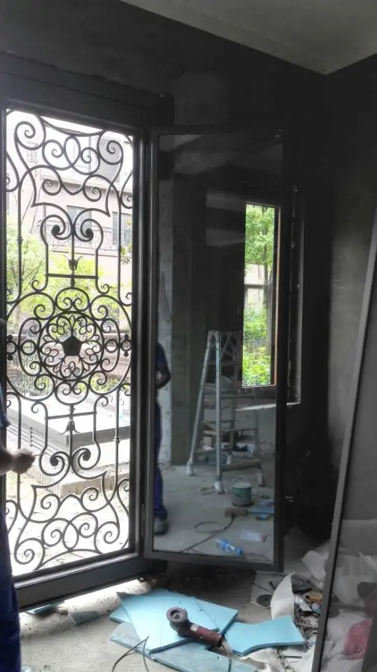 China Luxury Wrought Iron Doors Heavy Duty Security Front Door With Flyscreen