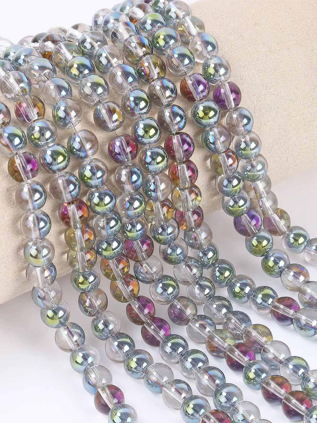 A strand of 50 pcs of 8mm two-color glitter glass beads is used for women\'s DIY jewelry making