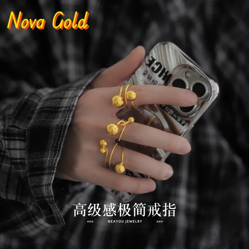 NovaGlod 999924K gold, super simple geometric irregular size ball ring design sense of the ball ring