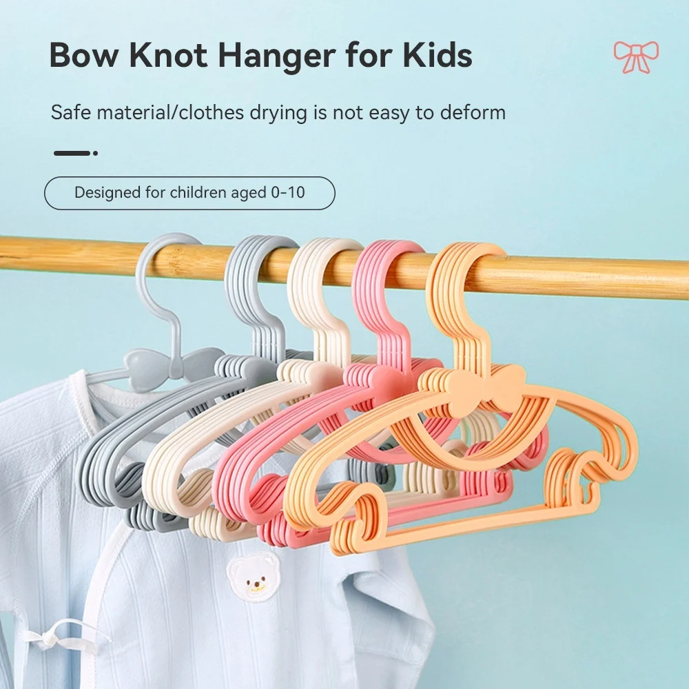 10Pcs Cute Bowknot Children Hangers Portable Plastic Display Hangers Windproof kids Outerwear Hangers Baby Clothing Organizer