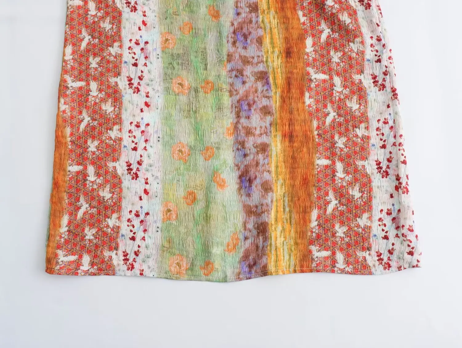 夏の新スタイルの女性のロングスカート透かし絵画デザインミディスカートフレンチスタイルプリントカジュアルポリエステル繊維