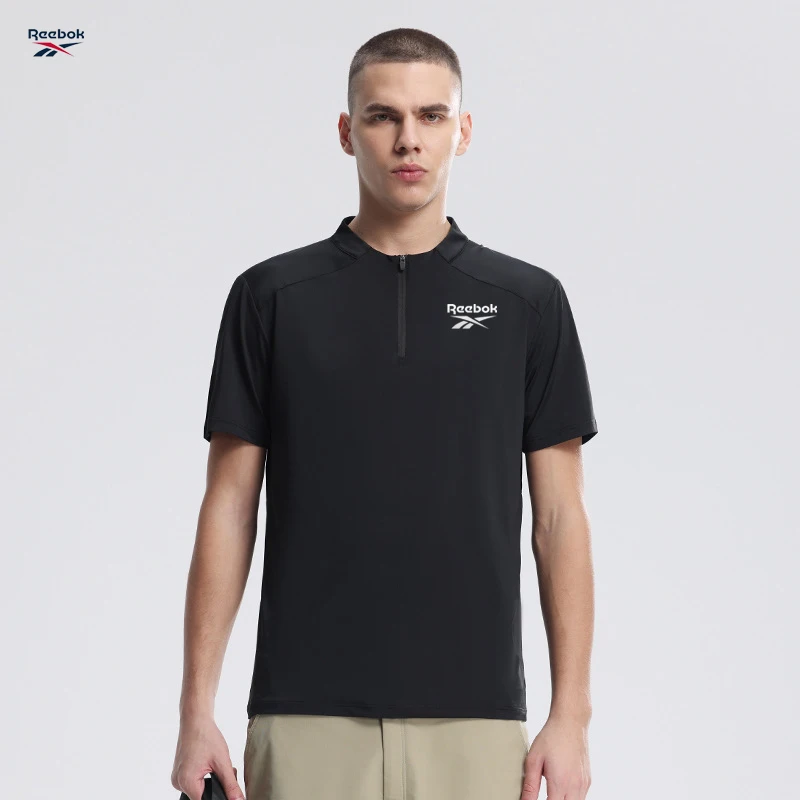 Camisa de manga corta de secado rápido para hombre de la marca Reebok. Excelente transpirabilidad. Ideal para hombres deportistas que realizan actividades como la [actividad].