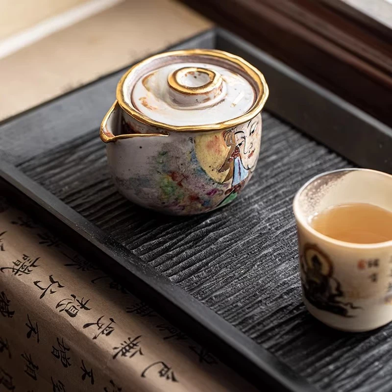 Hand-painted, teapot is retro. If you grab pot, cover bowl and open piece, you can raise teapot.
