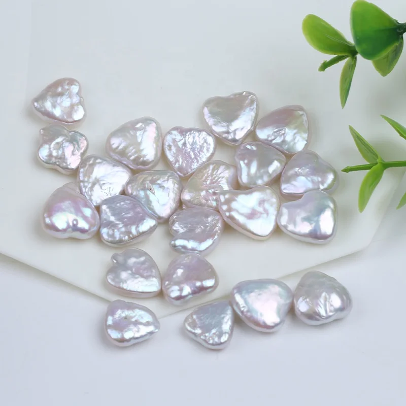 

Hot sale 12-13mm white color natural freshwater heart shaped baroque loose pearls beads