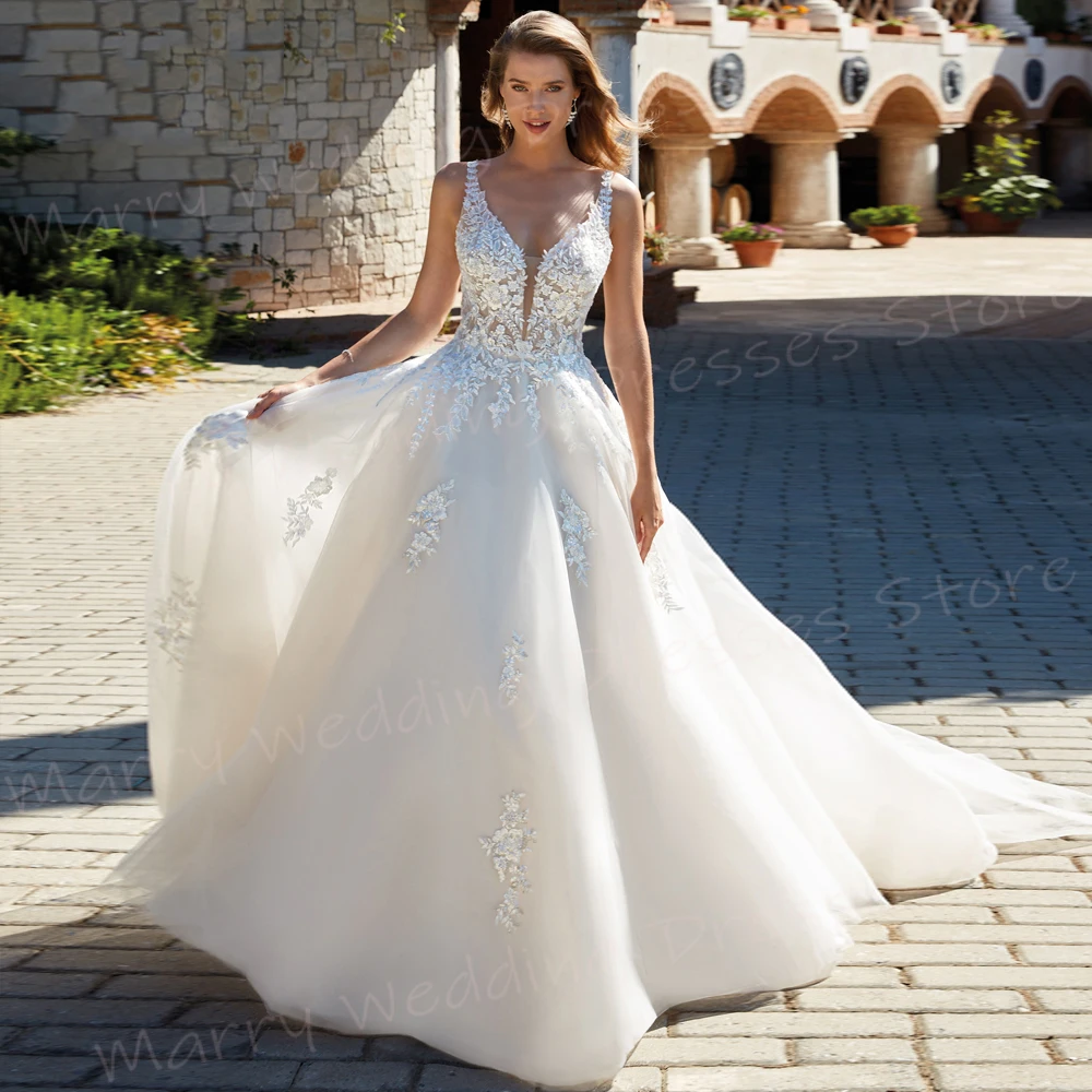 Nuovi abiti da sposa da donna alla moda A Line graziosi Appliques di pizzo abiti da sposa senza maniche con bottoni abiti da spiaggia Novias Boda