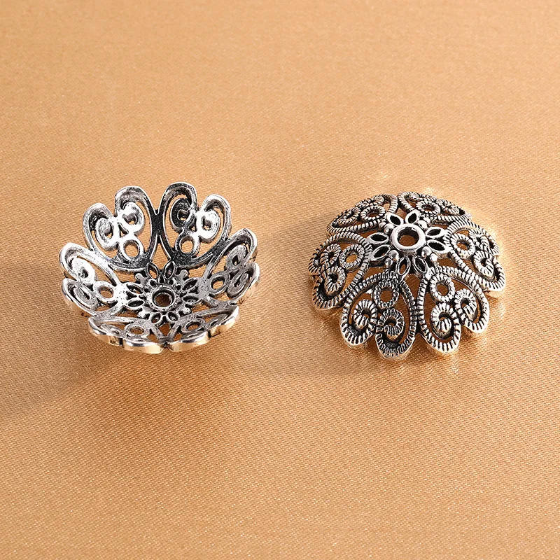 accessori per gioielli fai da te: lega argentata antica che preserva il colore, supporti per fiori retrò scavati, tappetino per cappelli e perline di perline