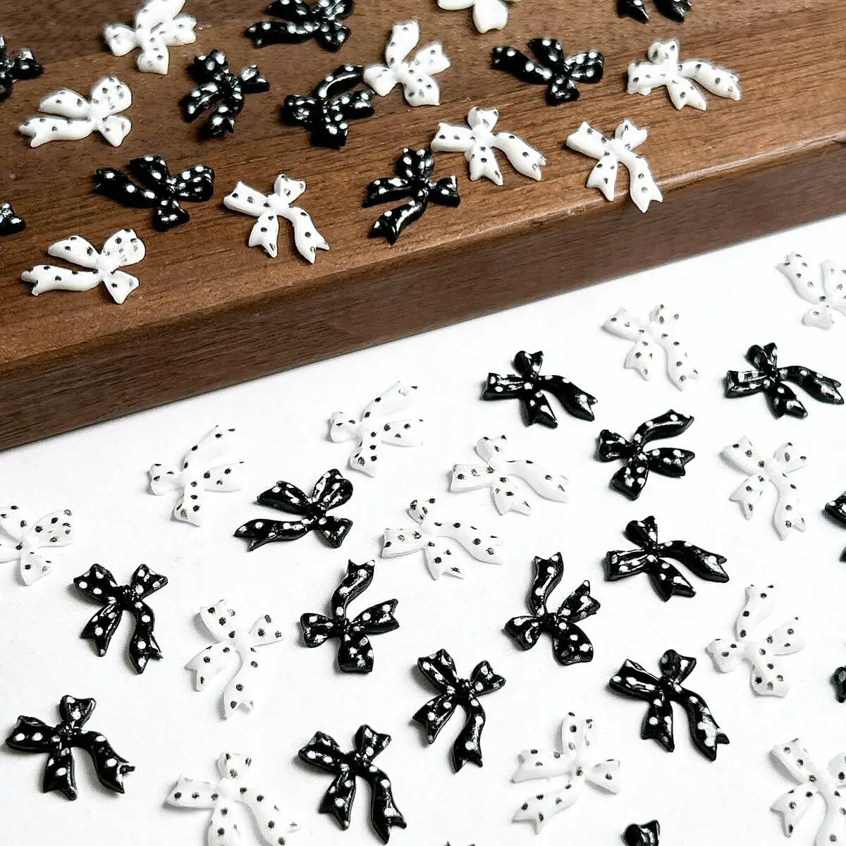 

50PCS Classic Black White Ribbon Bow Nail Charms 3D Creative Polka Dot Bow Resin Nail Art Decorations for DIY Fairy Nails Crafts