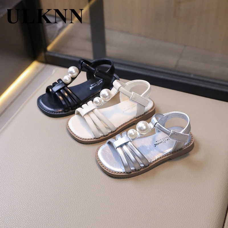 

Girls' Silver sandals 2024 summer new children's shoes Fashion pearl soft soled princess shoes beach shoes