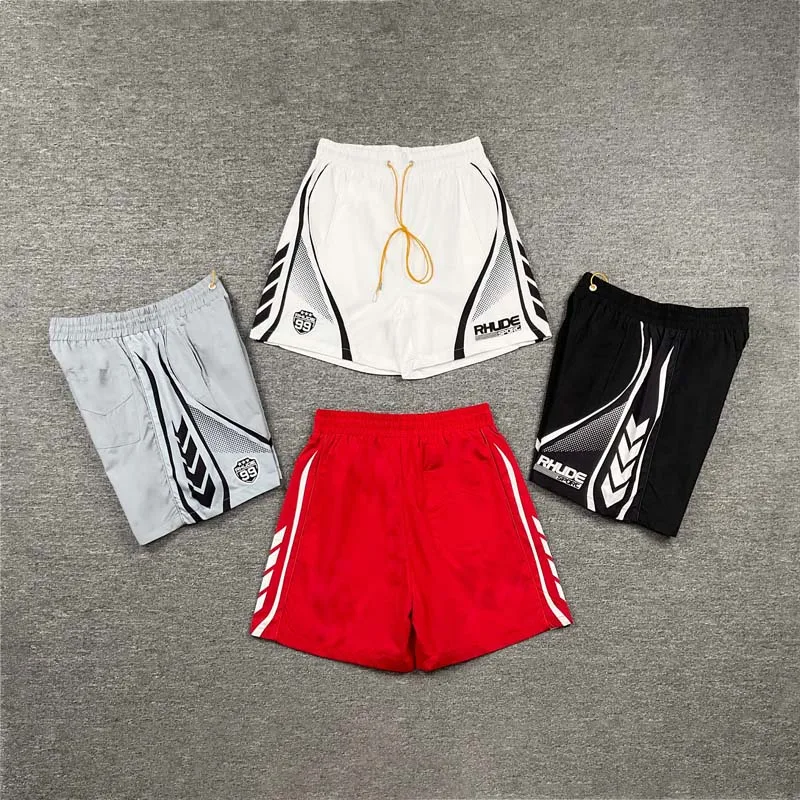 Streetwear Trendy Geometric Spliced Men Rhude Shorts Loose Wide‑Leg Woven Lined Sports Pants Drawstring Waist Casual Mid Shorts
