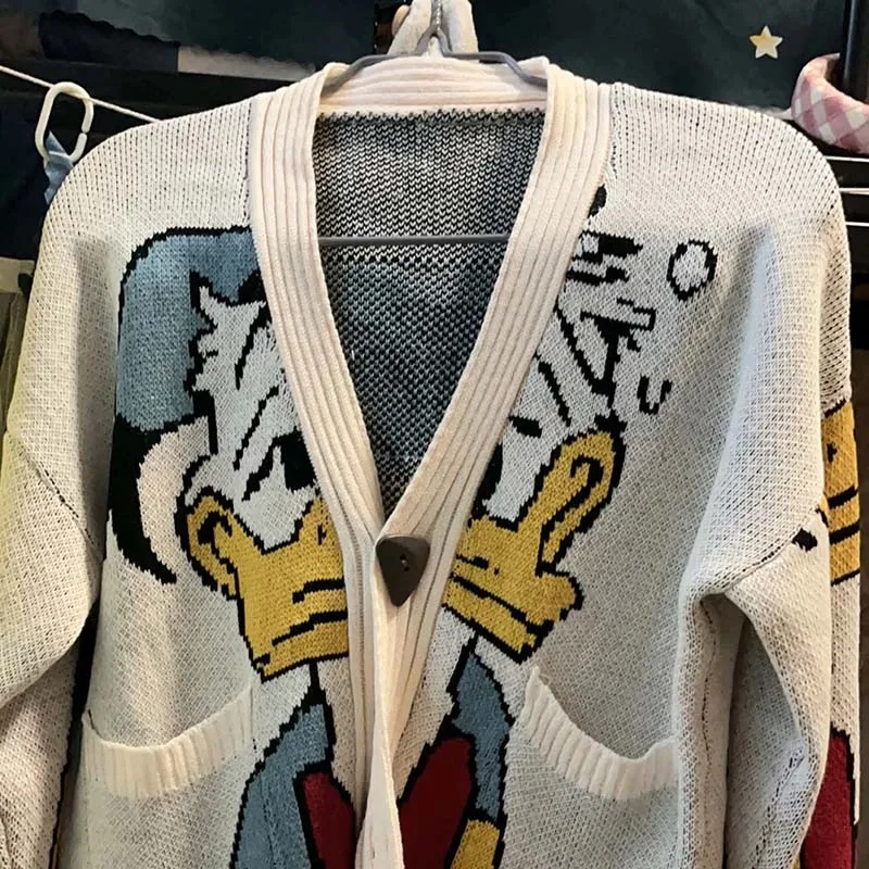 Donald Duck pull Disney Anime dessin animé femmes manteau automne/hiver Cardigan ample tricoté pull haut décontracté fille vêtements cadeau