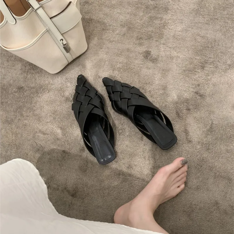 

Baotou pointed head half slippers women 2024 summer new Mueller flat sandals woven hollow sandals women