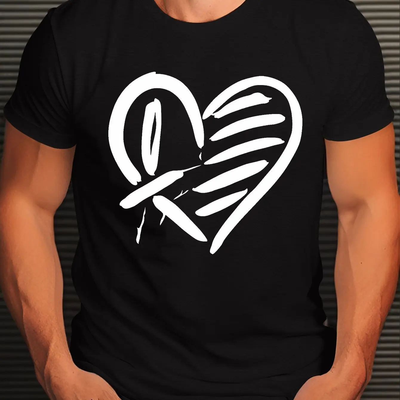 Men's black t-shirt featuring a bold heart design in white crafted from premium 100% cotton material for ultimate comfort