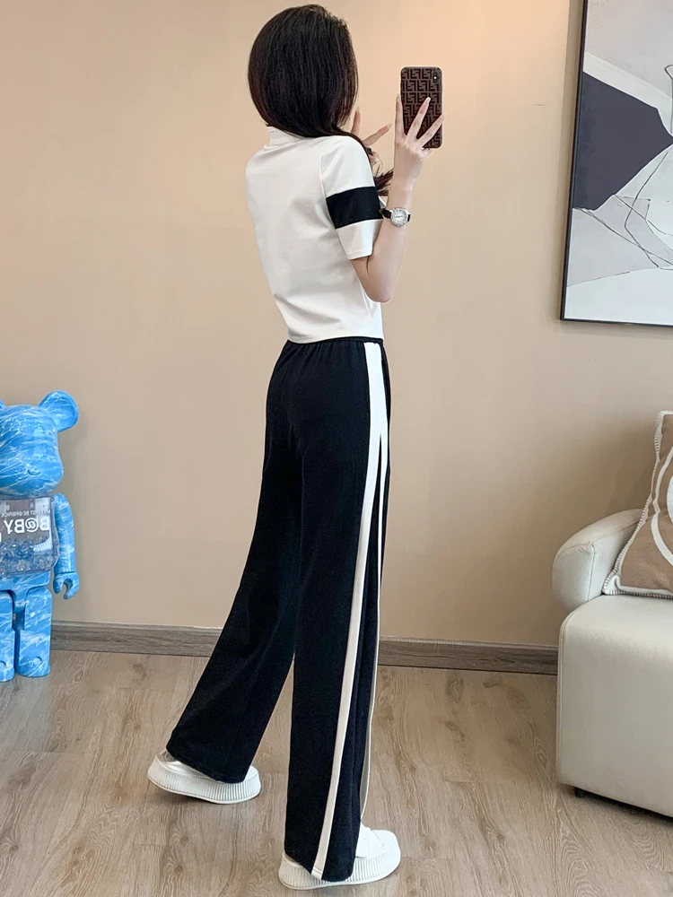 Conjunto de ropa deportiva informal de alta calidad para mujer en verano 2025, nuevo conjunto de dos piezas de moda reductor de edad de estilo coreano de manga corta