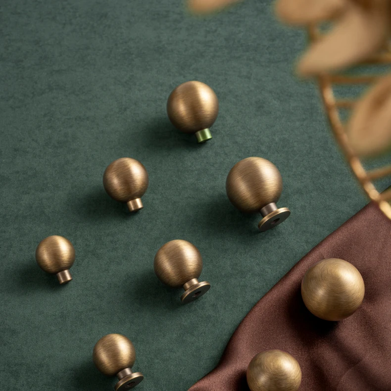 Round antique brushed brass cabinet knob — supplier illustration 14