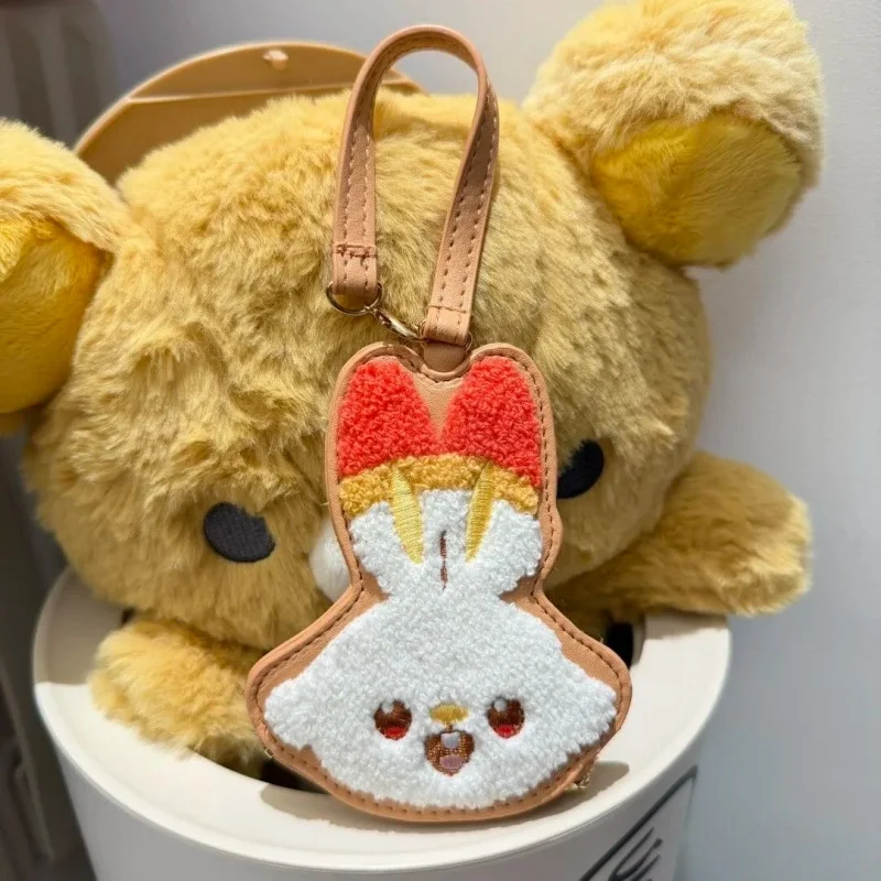 Täglicher tragbarer Aufbewahrungsbeutel Pokepeace Münzbörse Pikachu Piplup Rowlet Scorbunny Tandemaus Chenille PU-Leder Handgelenktasche für Fans – Detail 4