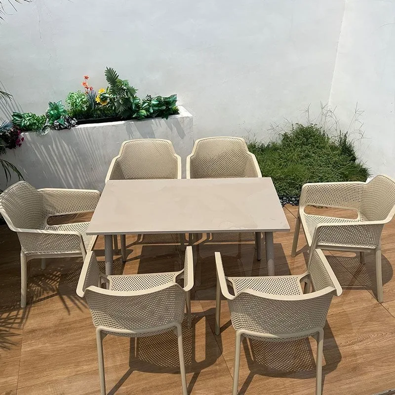 Rectangle carbon steel waterproof and sunscreen dining table, plastic chairs outside the courtyard garden