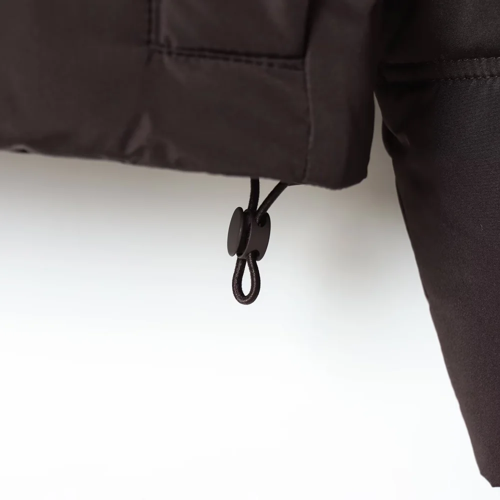 女性のシームルーズトップハイカラーパーカー長袖ジッパーストラップポケット弾性ロープ秋/冬の新しいコットンジャケット