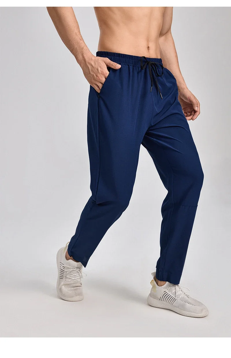 Autumn and winter new sports pants men, breathable casual fitness pants, outdoor running basketball fast dry pants
