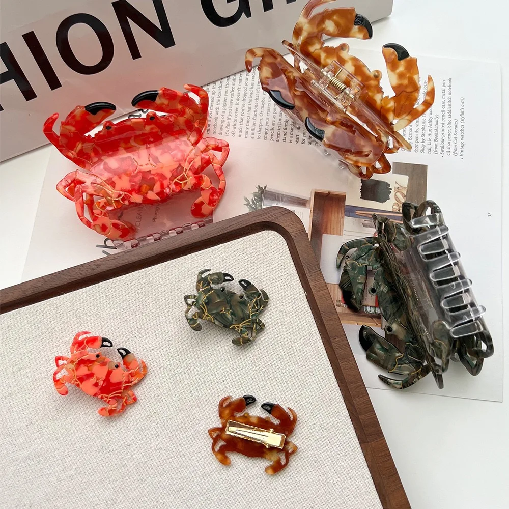 Крабовый коготь представляет собой нишевый и уникальный стиль летнего отдыха. Это изготовлен из высококачественного ацетатного материала, изготовленного вручную, с эмблемой.