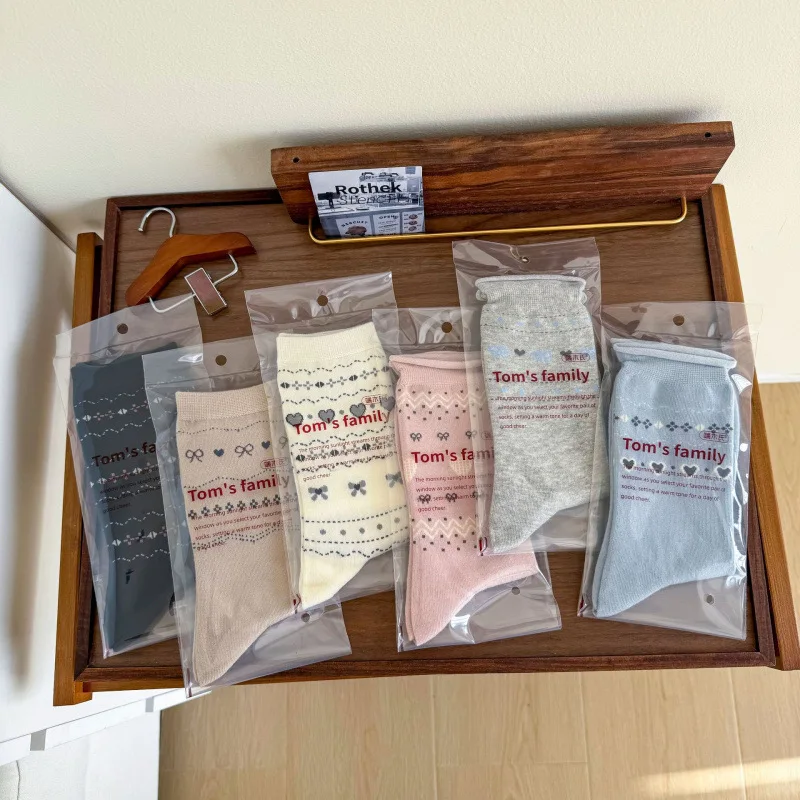 ربيع/صيف جديد الأبيض منتصف أنبوب الجوارب للنساء معرض جزيرة نمط القوس القلب لفة جوارب قطنية كلية نمط جوارب قطنية قصيرة