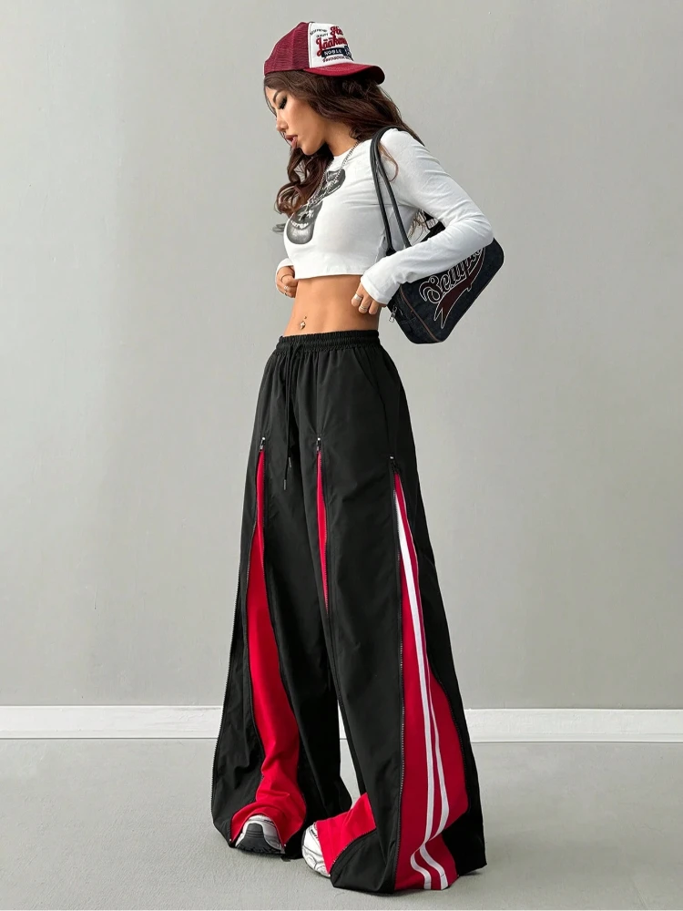 アメリカのストリート系ホットガール、カラーブロッキングトレンドファッション、原宿ヒップホップスタイル、ジッパー付きスプライシング、レトロな個性、ゆったりとしたフロアパンツ