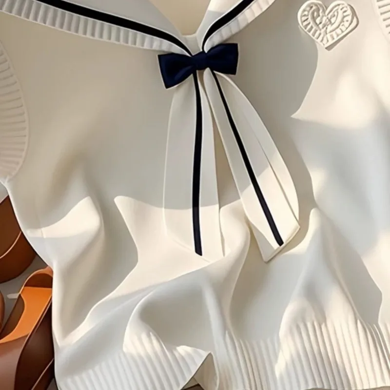 Loja de vendas leite branco gola marinha blusa feminina colete primavera verão nova gola boneca blusa coreano usar colete de malha boa aparência