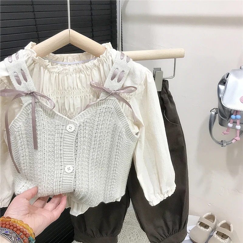 

Girls' Spring and Autumn Bow Knitted Vest Layered Long Sleeve Pullover Shirt Top Casual Pants Three-Piece Set